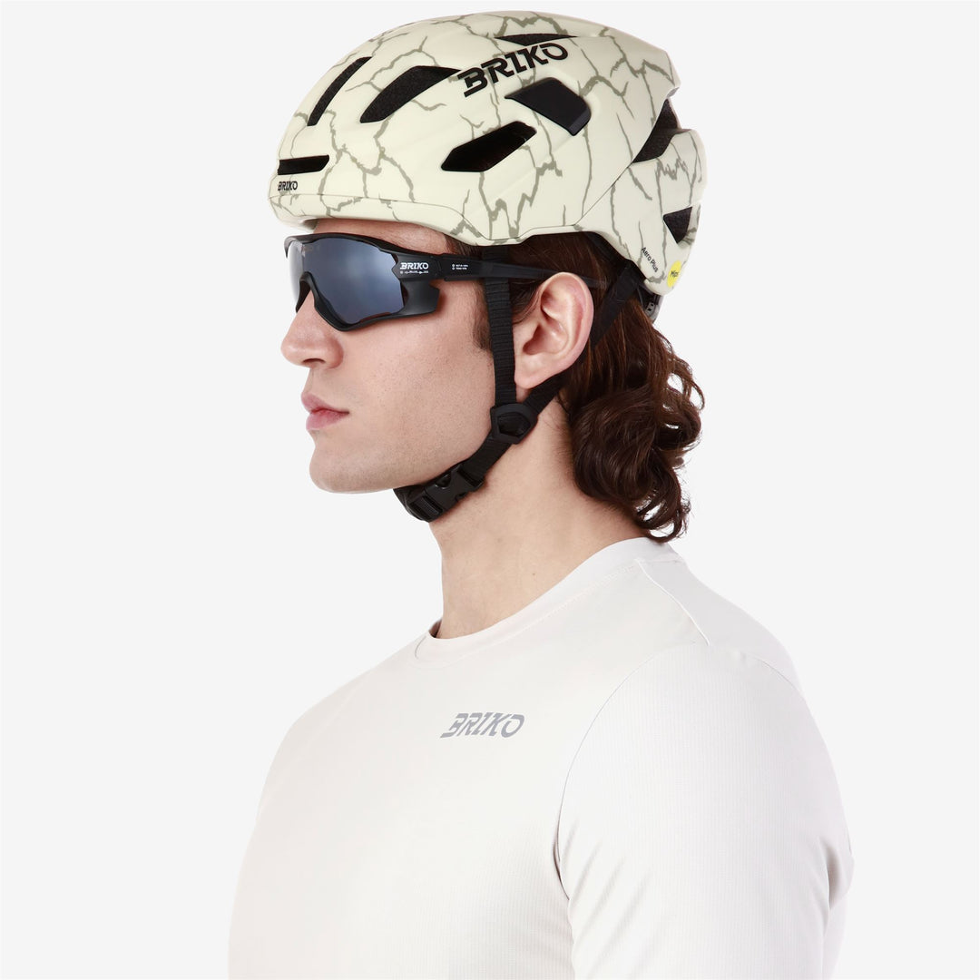Casque de vélo unisexe vert et beige avec ventilation et rembourrage main